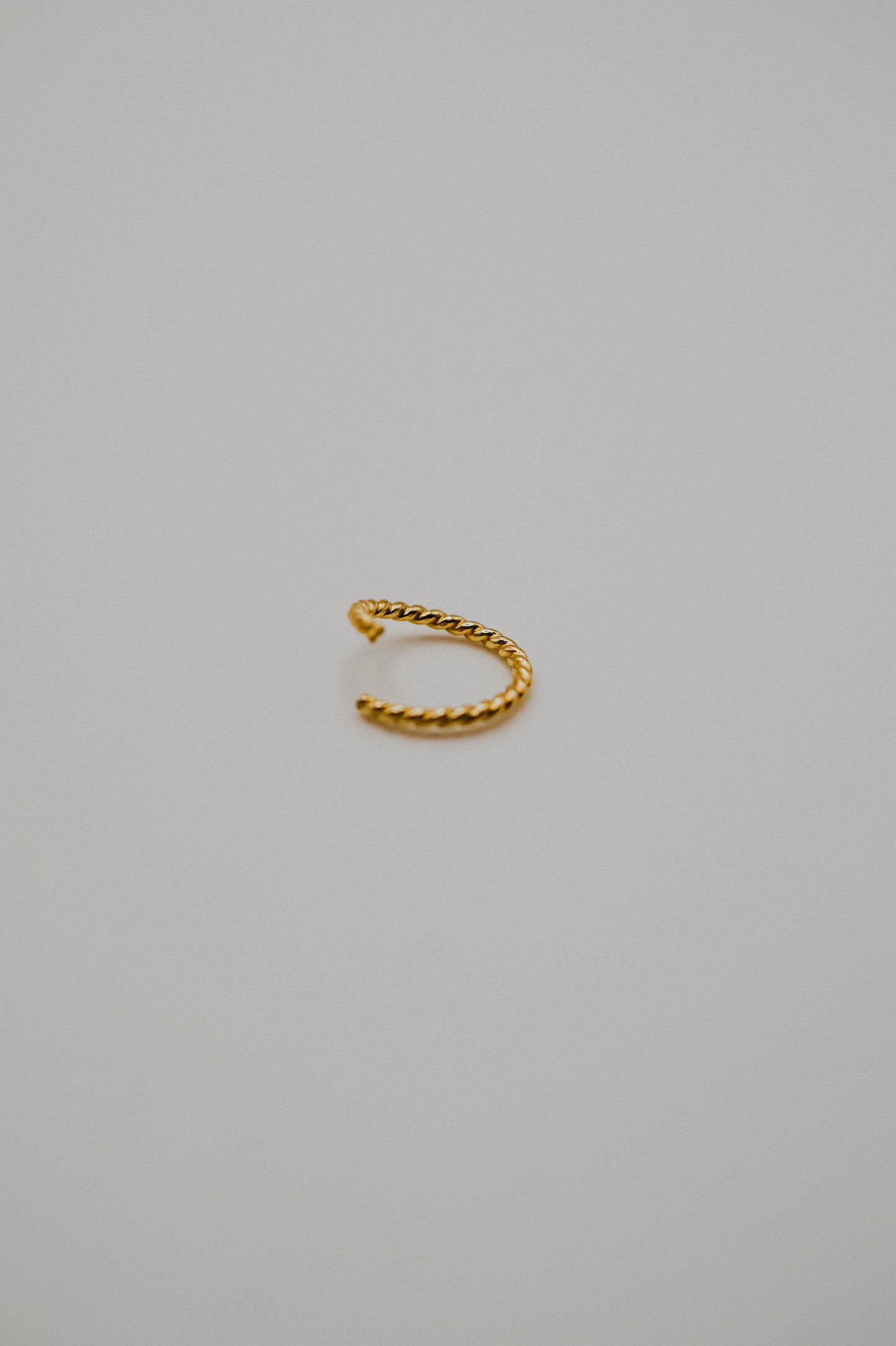 Twist Huggie Hoop Earring in Solid 14K Gold