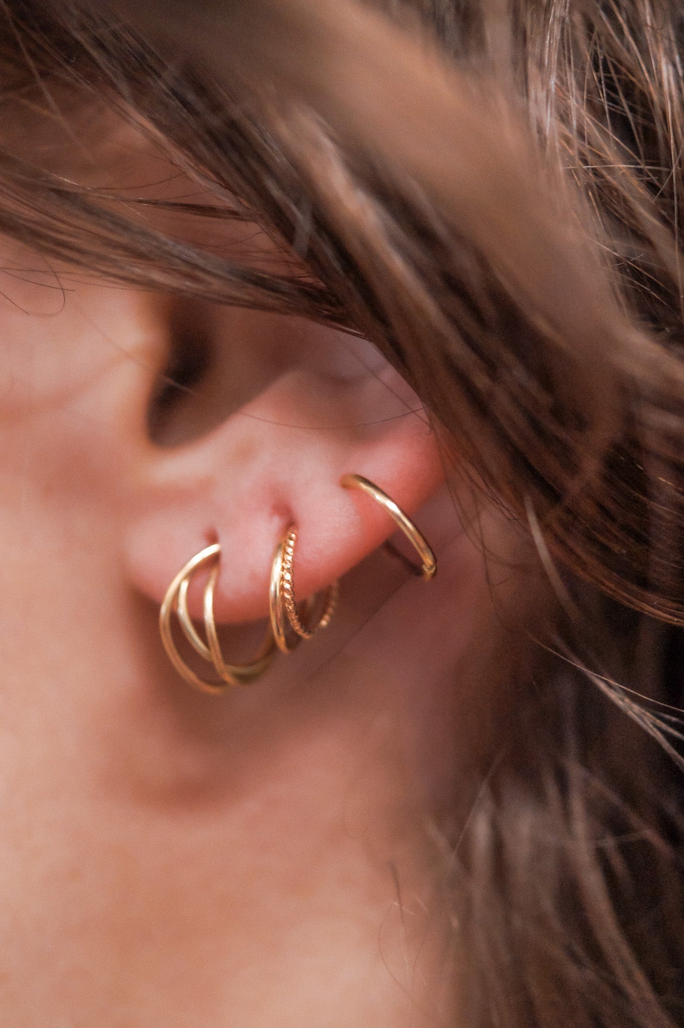 Twist Huggie Hoop Earring in Solid 14K Gold