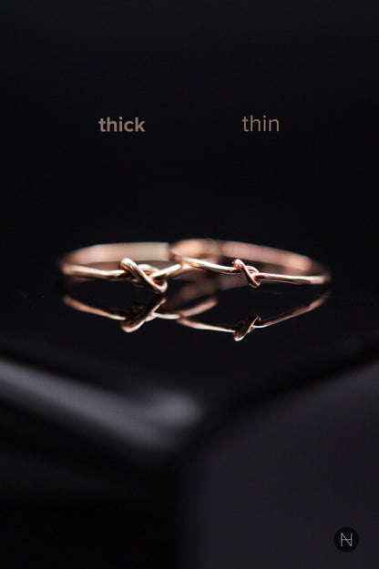 Thick and thin knot ring comparison side by side in 14k Rose Gold Fill.
