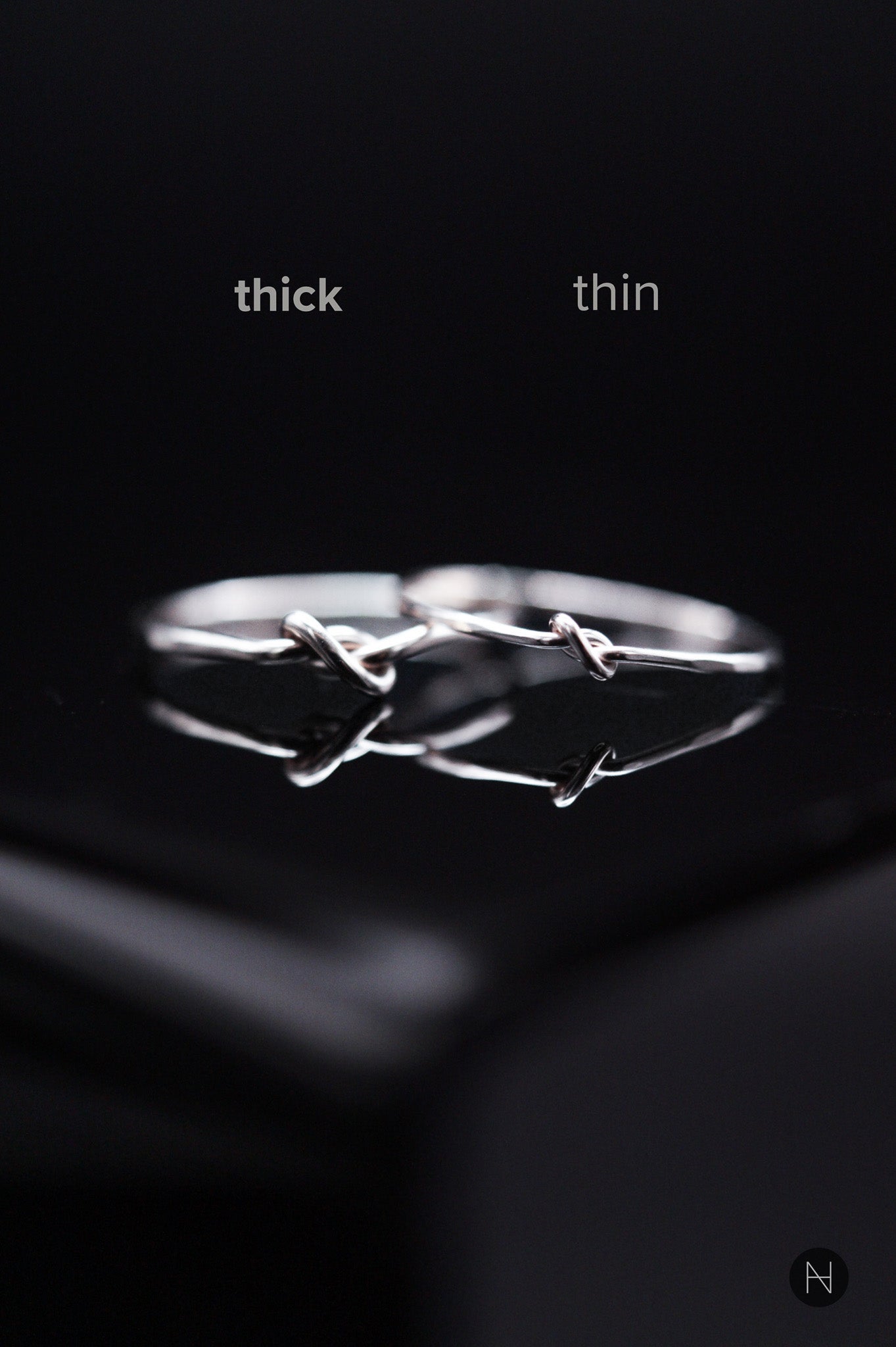 Thick and thin knot ring comparison side by side in Sterling Silver.