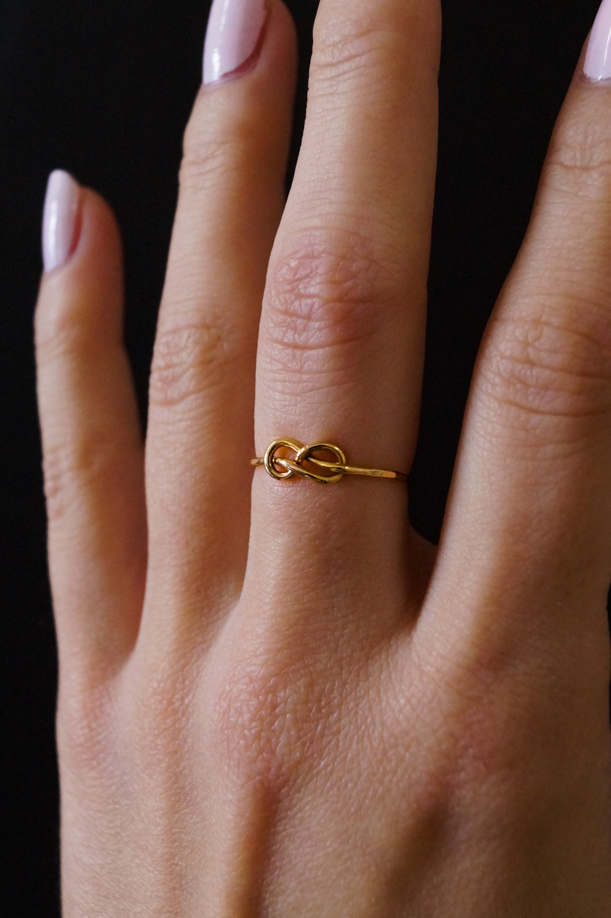 Infinity knot ring rose on sale gold